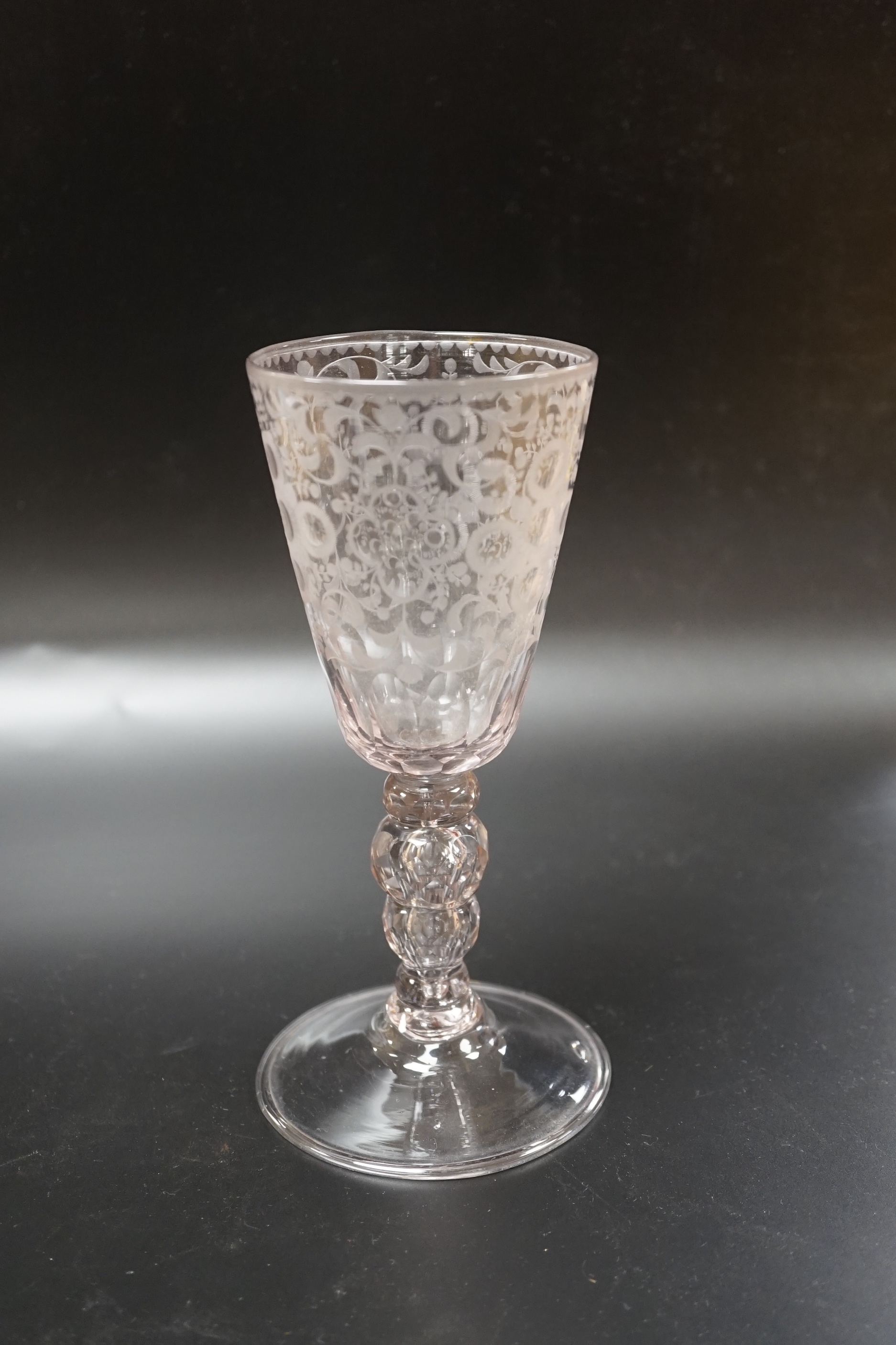 A late 18th century Dutch wheel engraved conical bowl glass goblet, 19cm